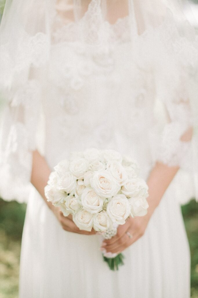 Bride holding wedding flowers