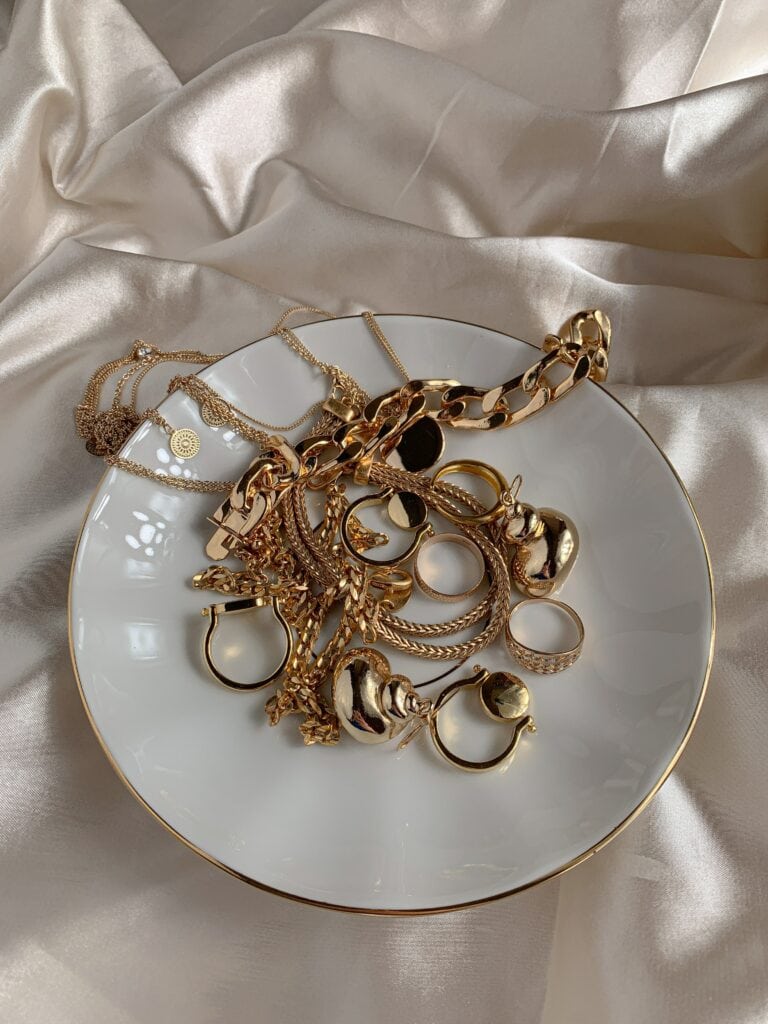 flatlay with jewelry on a plate